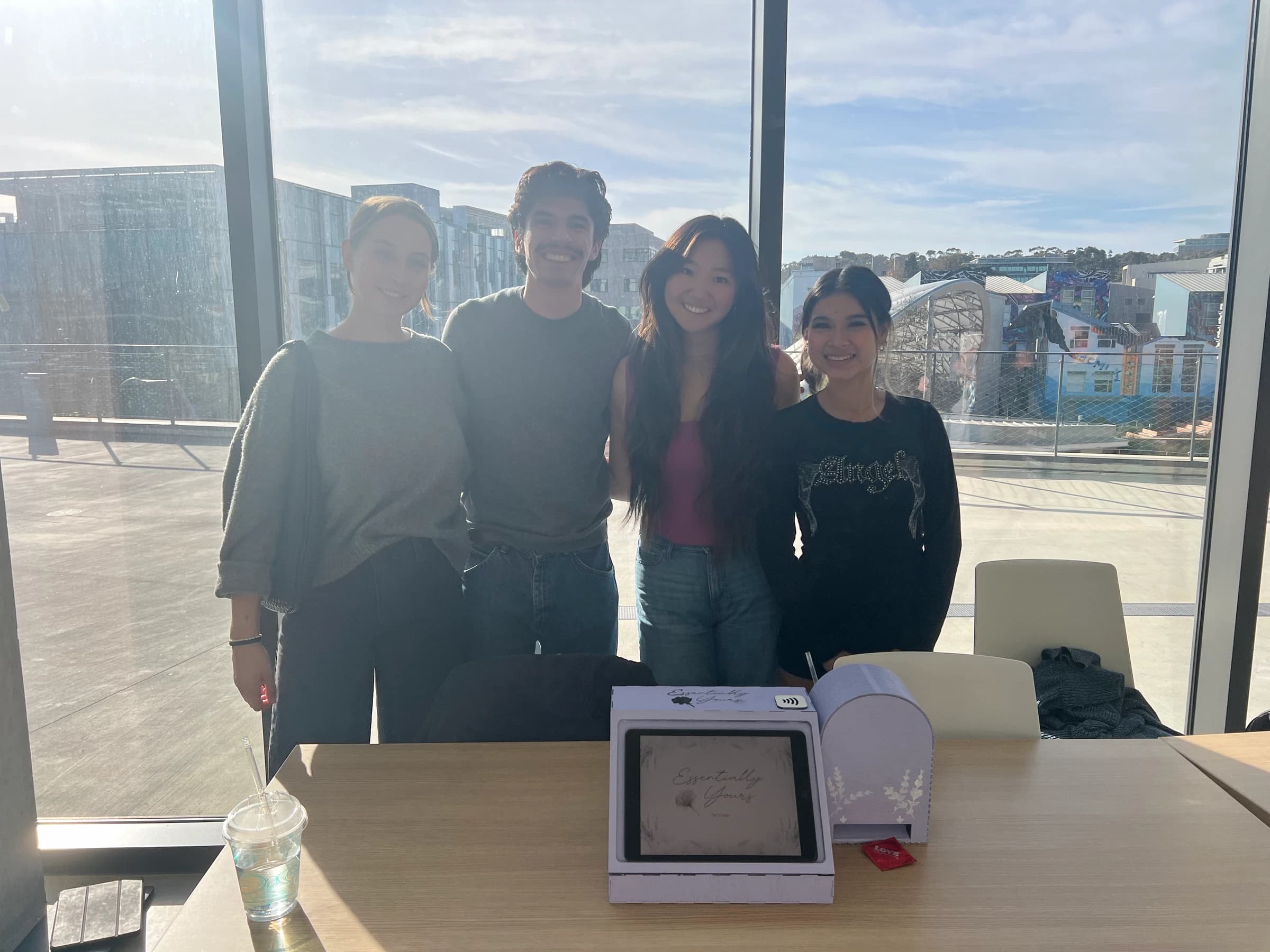 The Essentially Yours team with their physical kiosk.